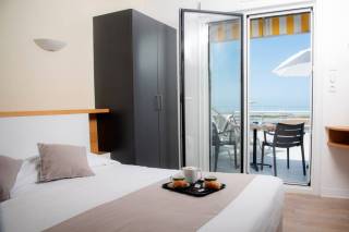 Chambre de l'Htel les Dunes avec vue sur l'ocan